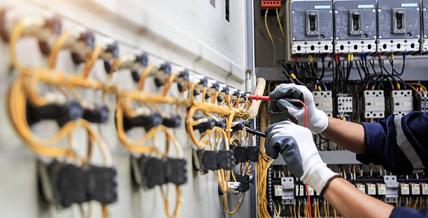Professional Electrician technician working in Camanche, IA